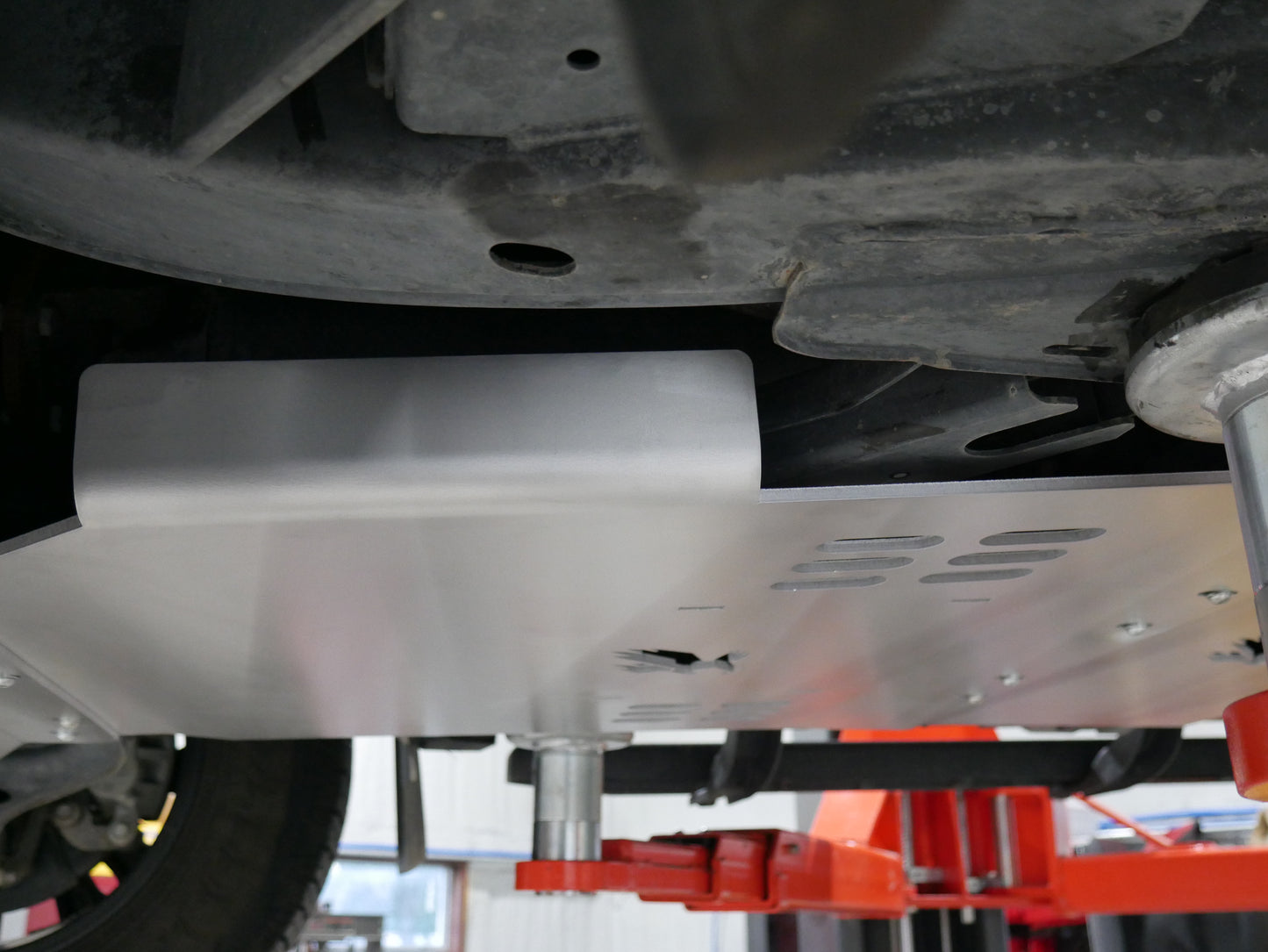 Transmission skid plate driver side view